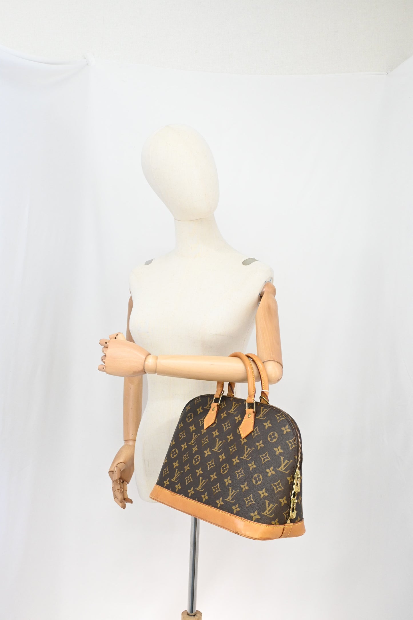Louis Vuitton Alma PM in Monogram Canvas