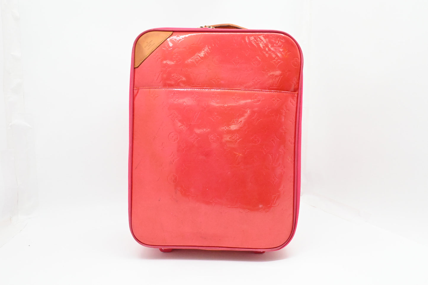 Louis Vuitton Pegase 45 in Grapefruit Vernis Leather