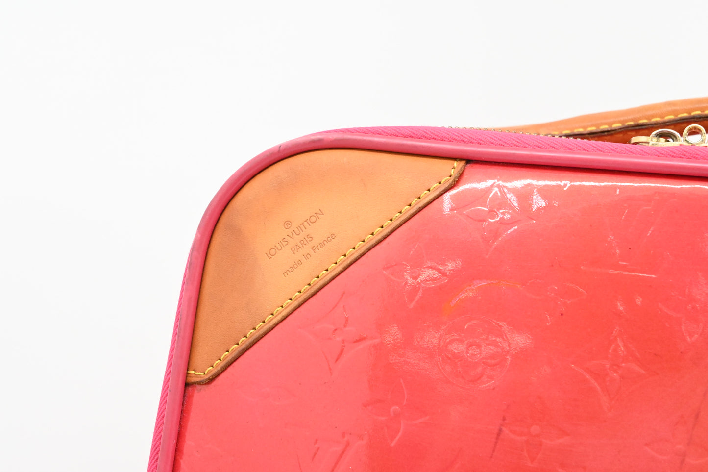 Louis Vuitton Pegase 45 in Grapefruit Vernis Leather