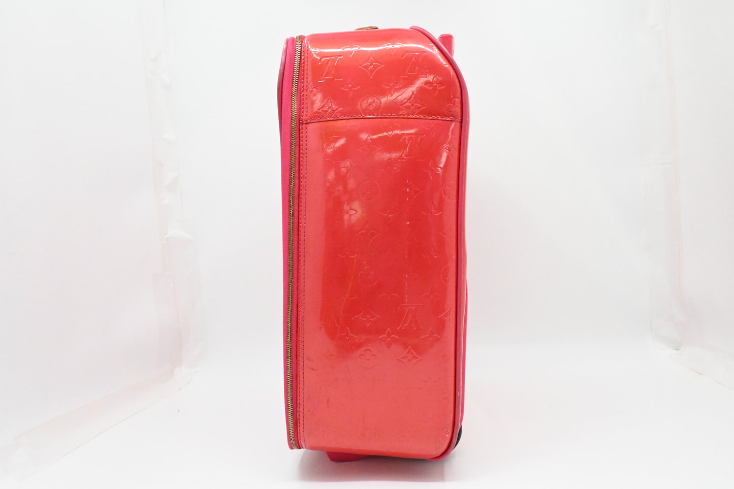 Louis Vuitton Pegase 45 in Grapefruit Vernis Leather