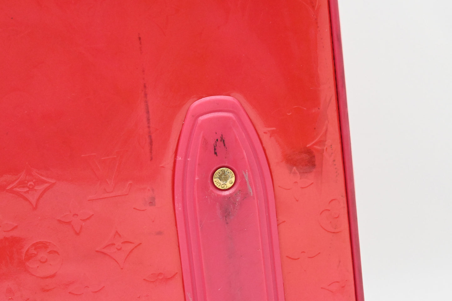 Louis Vuitton Pegase 45 in Grapefruit Vernis Leather
