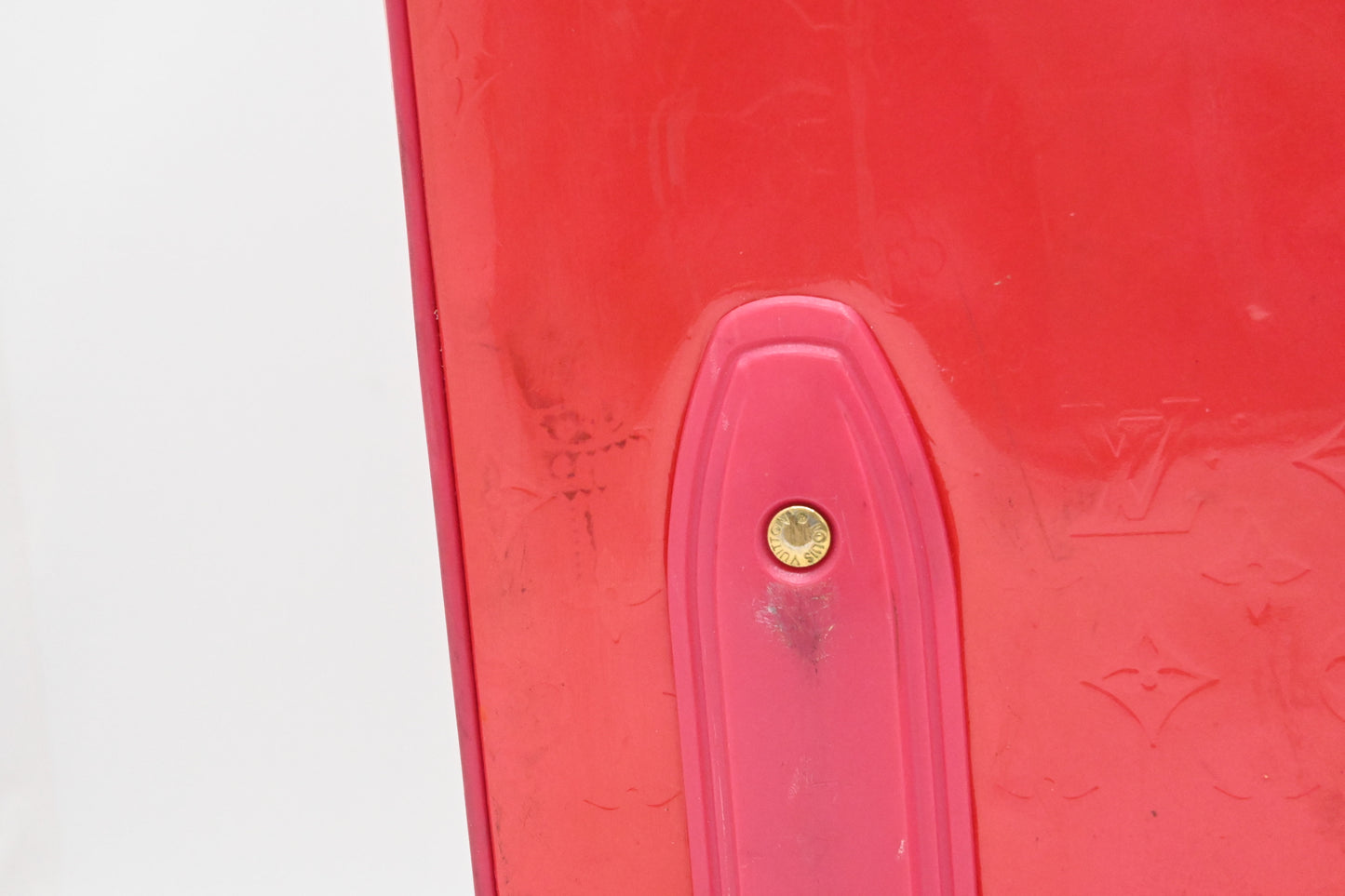Louis Vuitton Pegase 45 in Grapefruit Vernis Leather