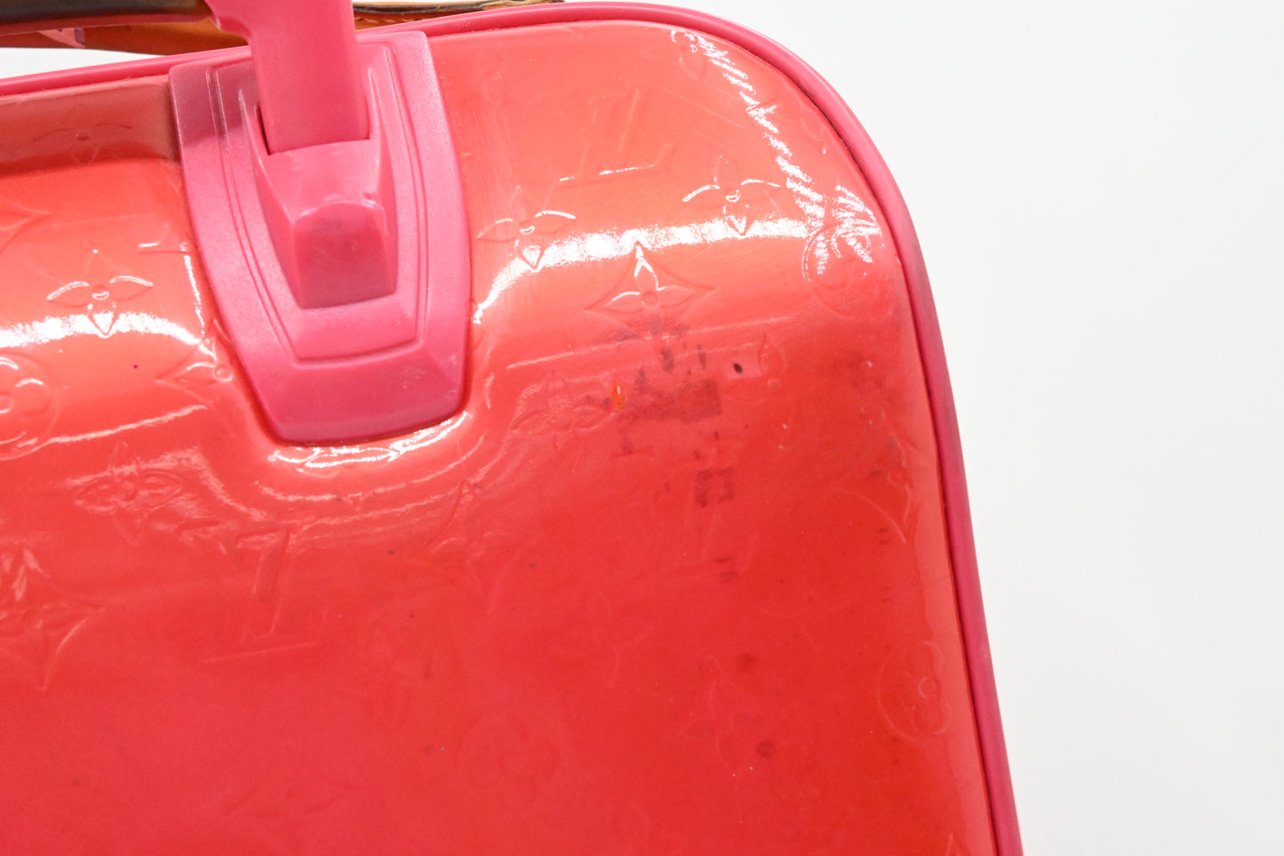 Louis Vuitton Pegase 45 in Grapefruit Vernis Leather
