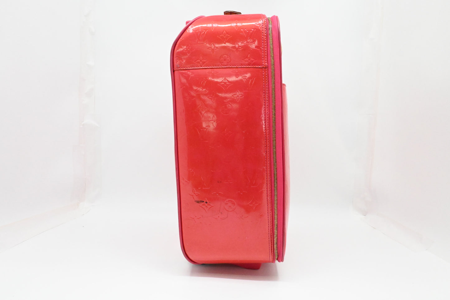 Louis Vuitton Pegase 45 in Grapefruit Vernis Leather