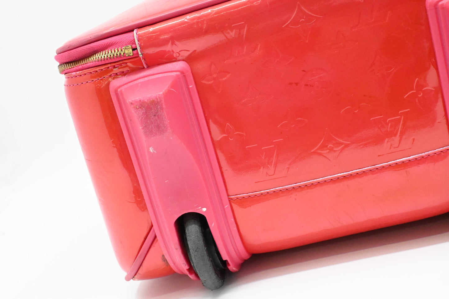 Louis Vuitton Pegase 45 in Grapefruit Vernis Leather