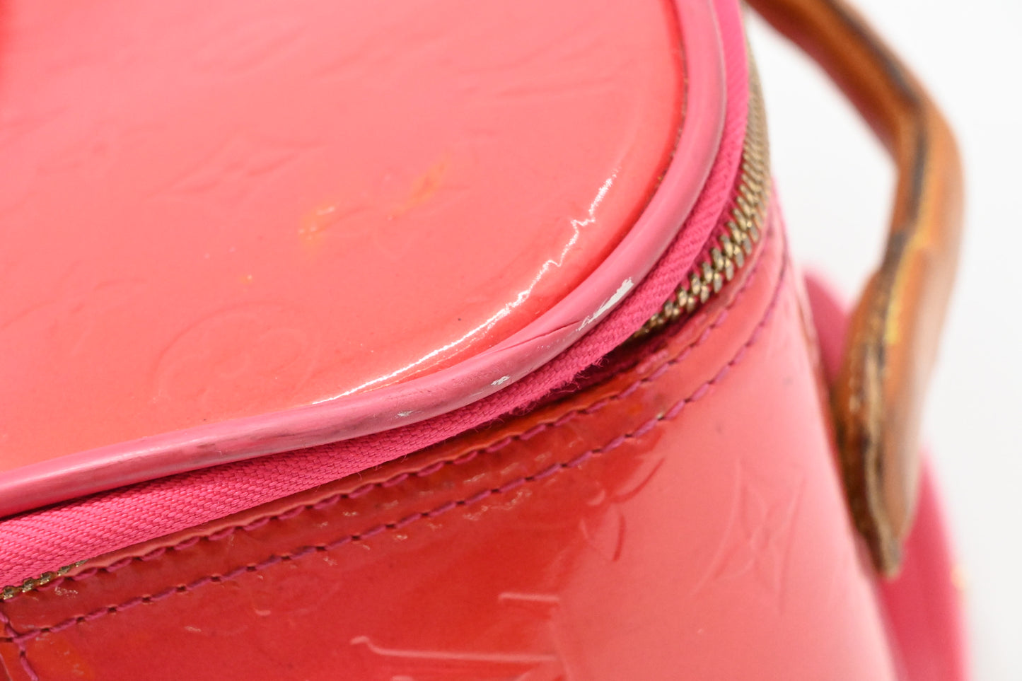Louis Vuitton Pegase 45 in Grapefruit Vernis Leather
