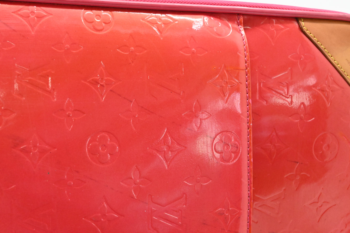 Louis Vuitton Pegase 45 in Grapefruit Vernis Leather