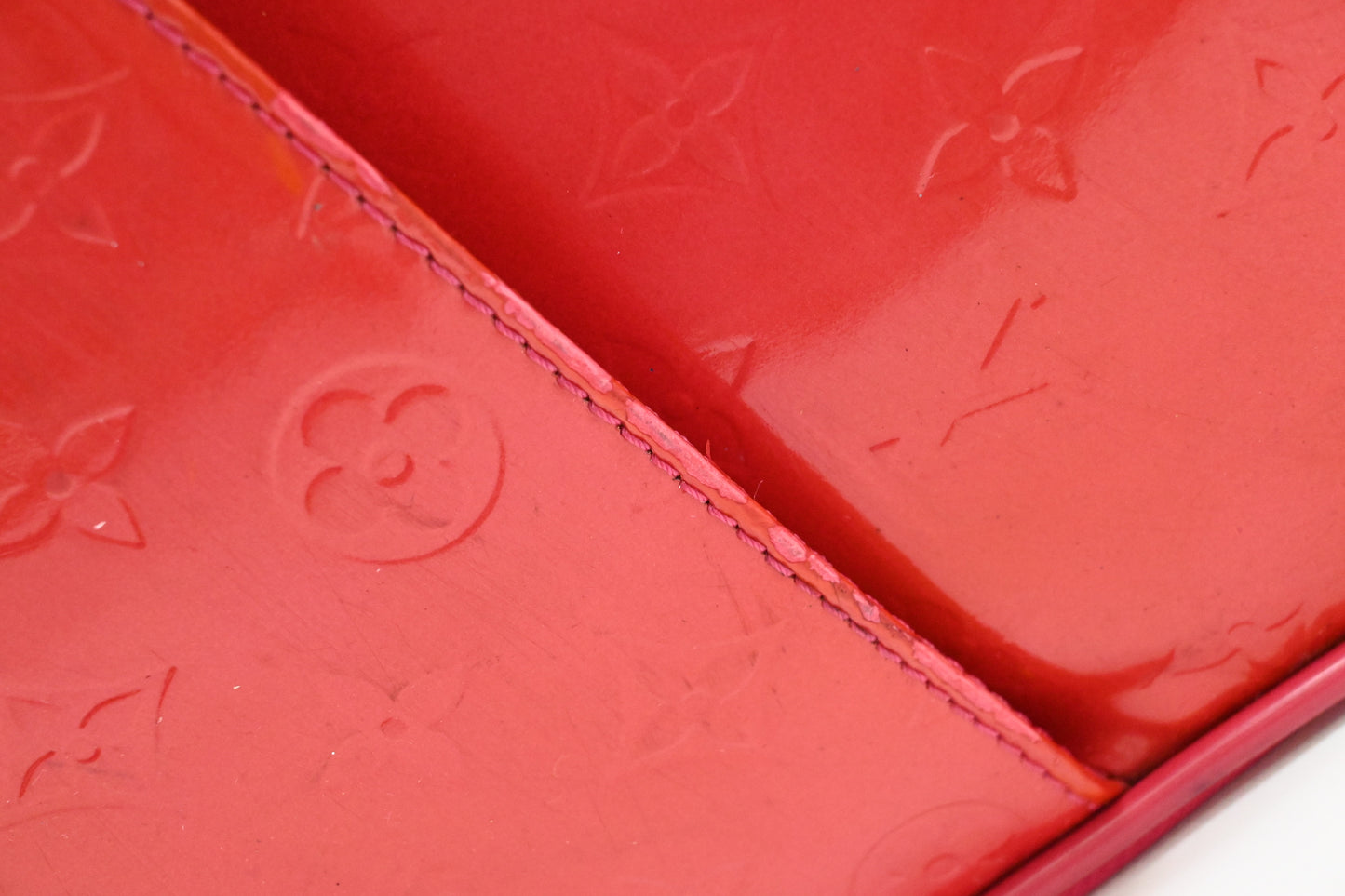 Louis Vuitton Pegase 45 in Grapefruit Vernis Leather