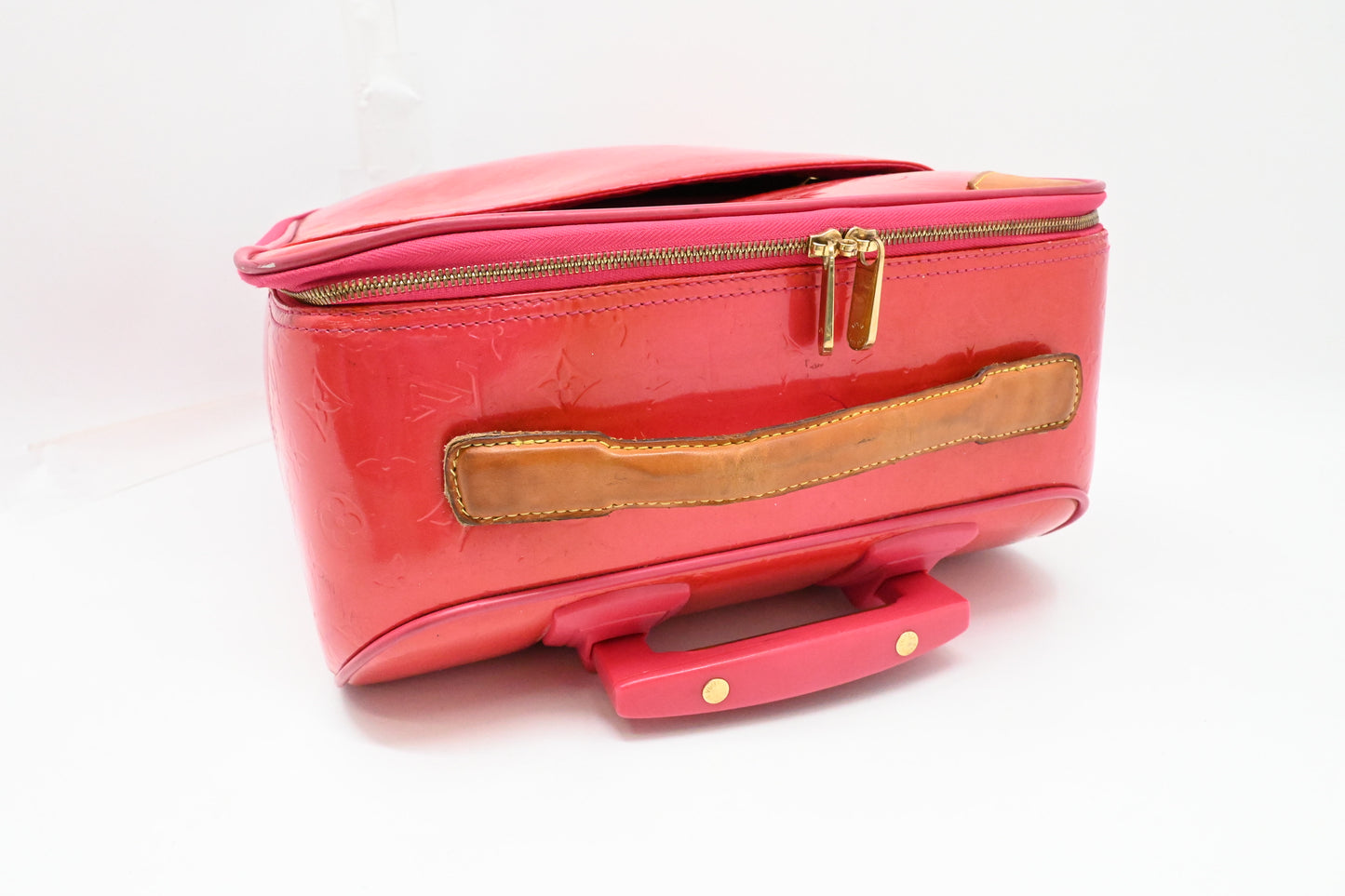 Louis Vuitton Pegase 45 in Grapefruit Vernis Leather