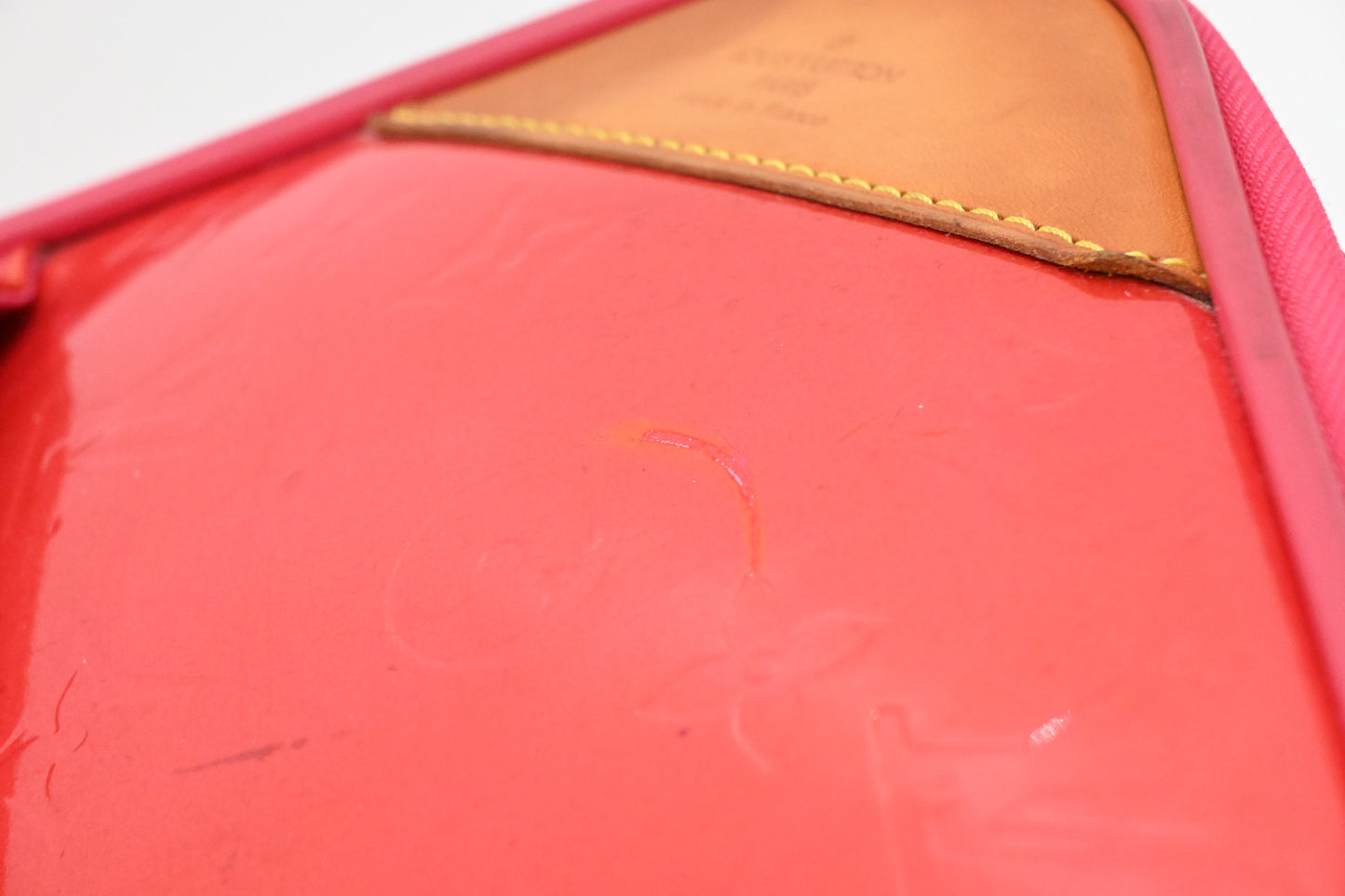 Louis Vuitton Pegase 45 in Grapefruit Vernis Leather