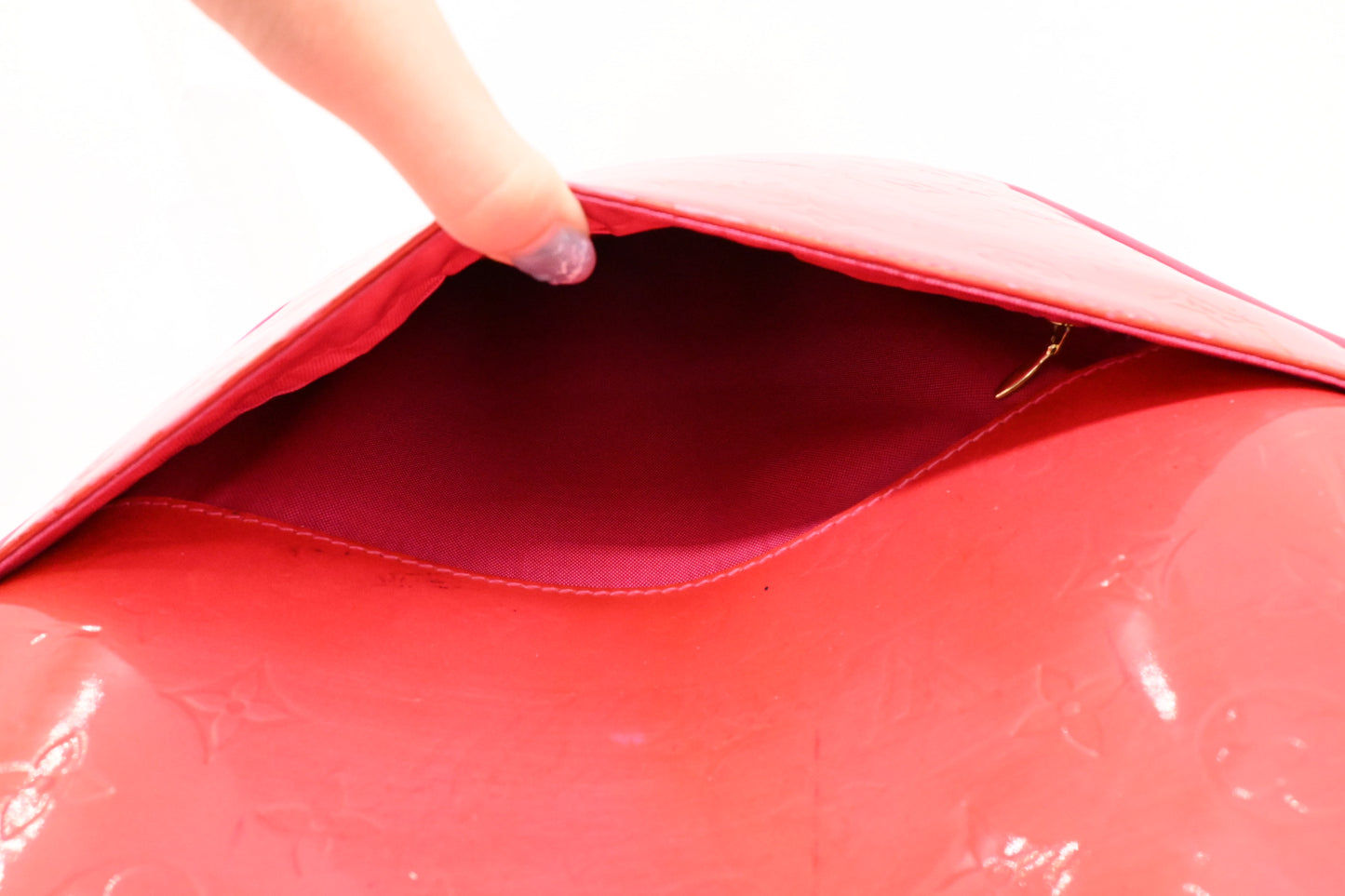 Louis Vuitton Pegase 45 in Grapefruit Vernis Leather