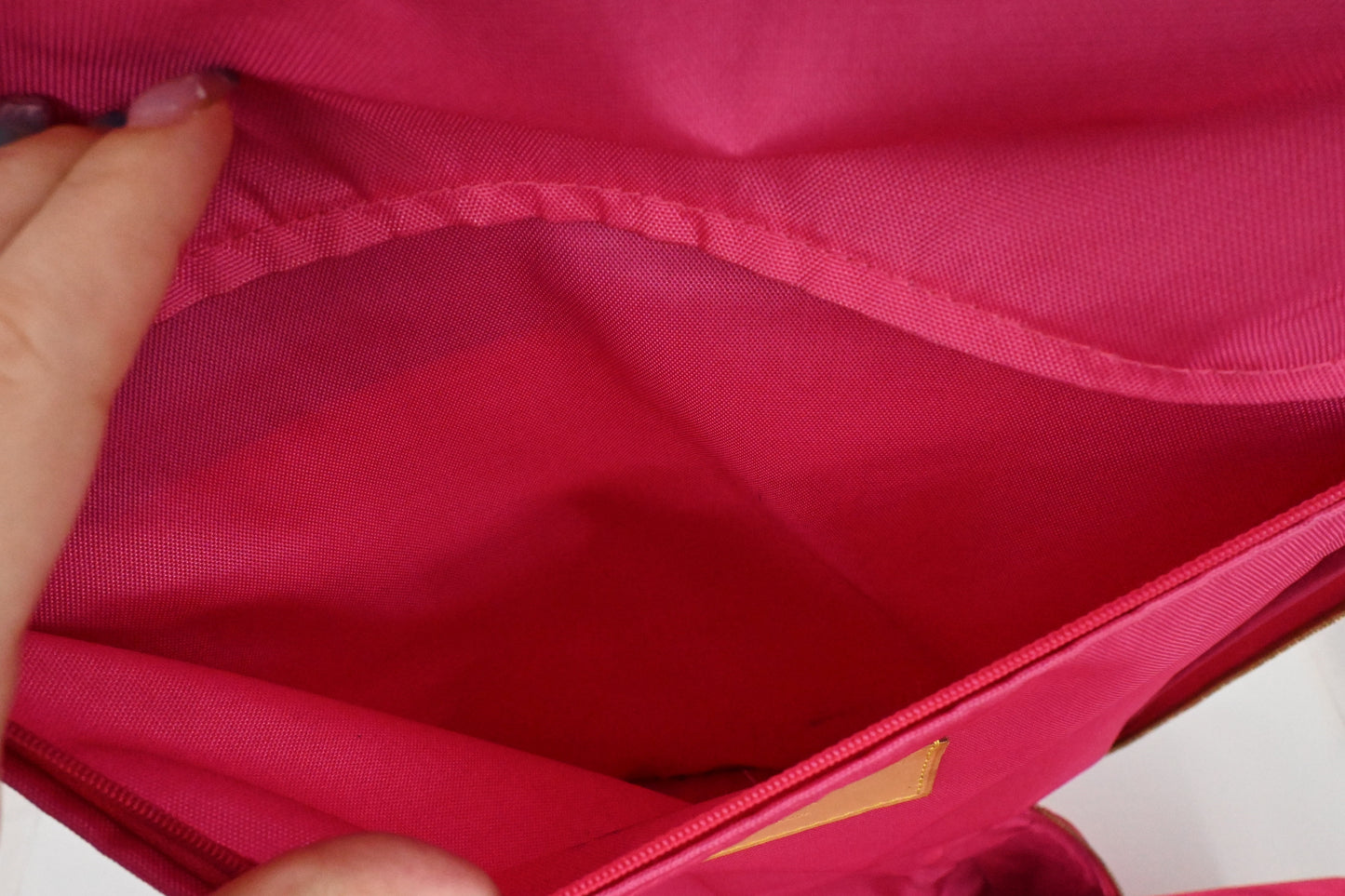 Louis Vuitton Pegase 45 in Grapefruit Vernis Leather