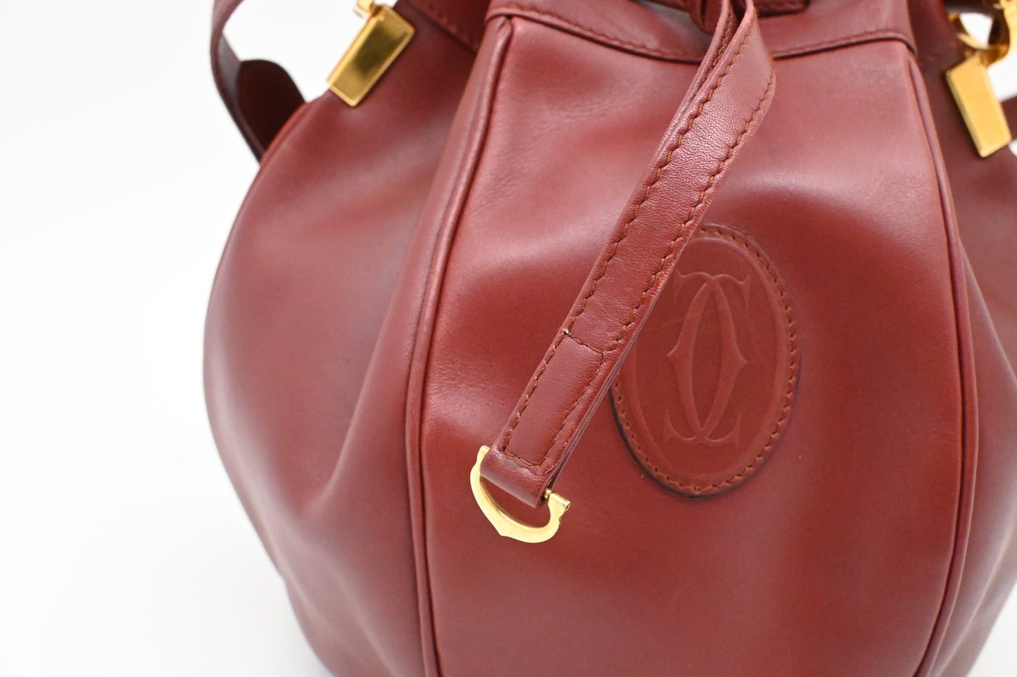 Cartier Crossbody Bucket Bag in Burgundy Leather