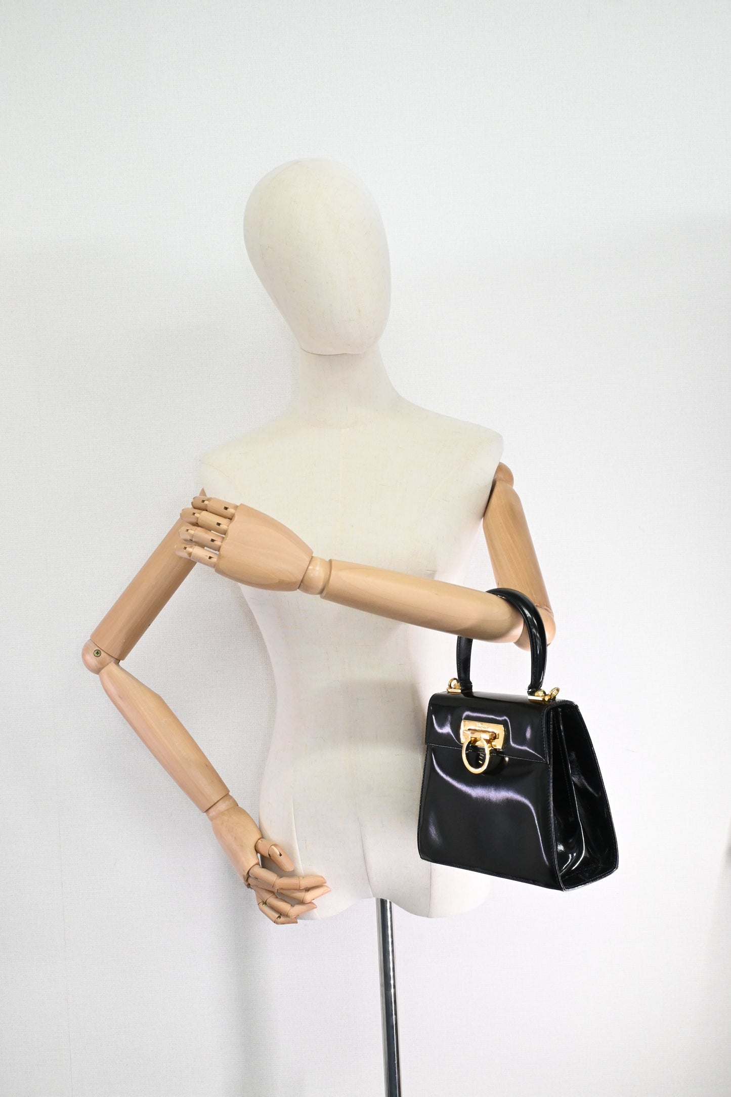 Ferragamo Top Handle Bag in Black Patent Leather