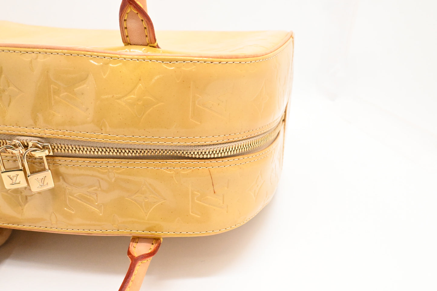Louis Vuitton Thompkins Square in Yellow Vernis Leather