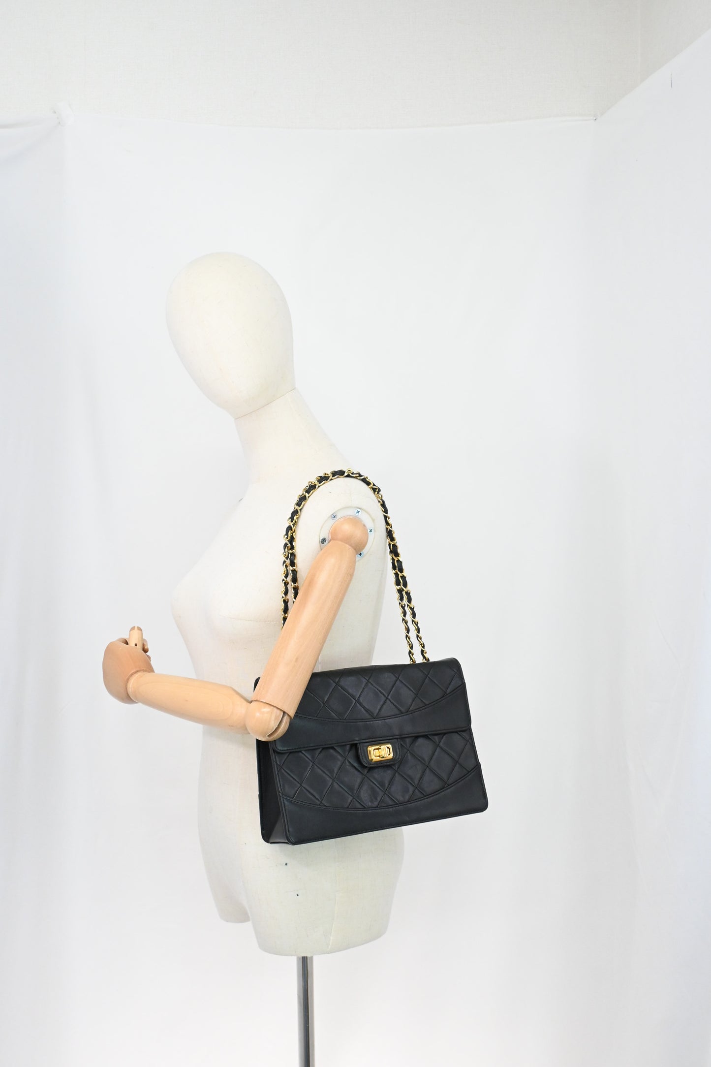 Chanel Trapezoid Flap in Black Matelassé Leather