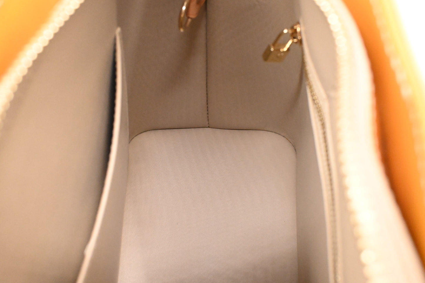 Louis Vuitton Houston in Yellow Vernis Leather