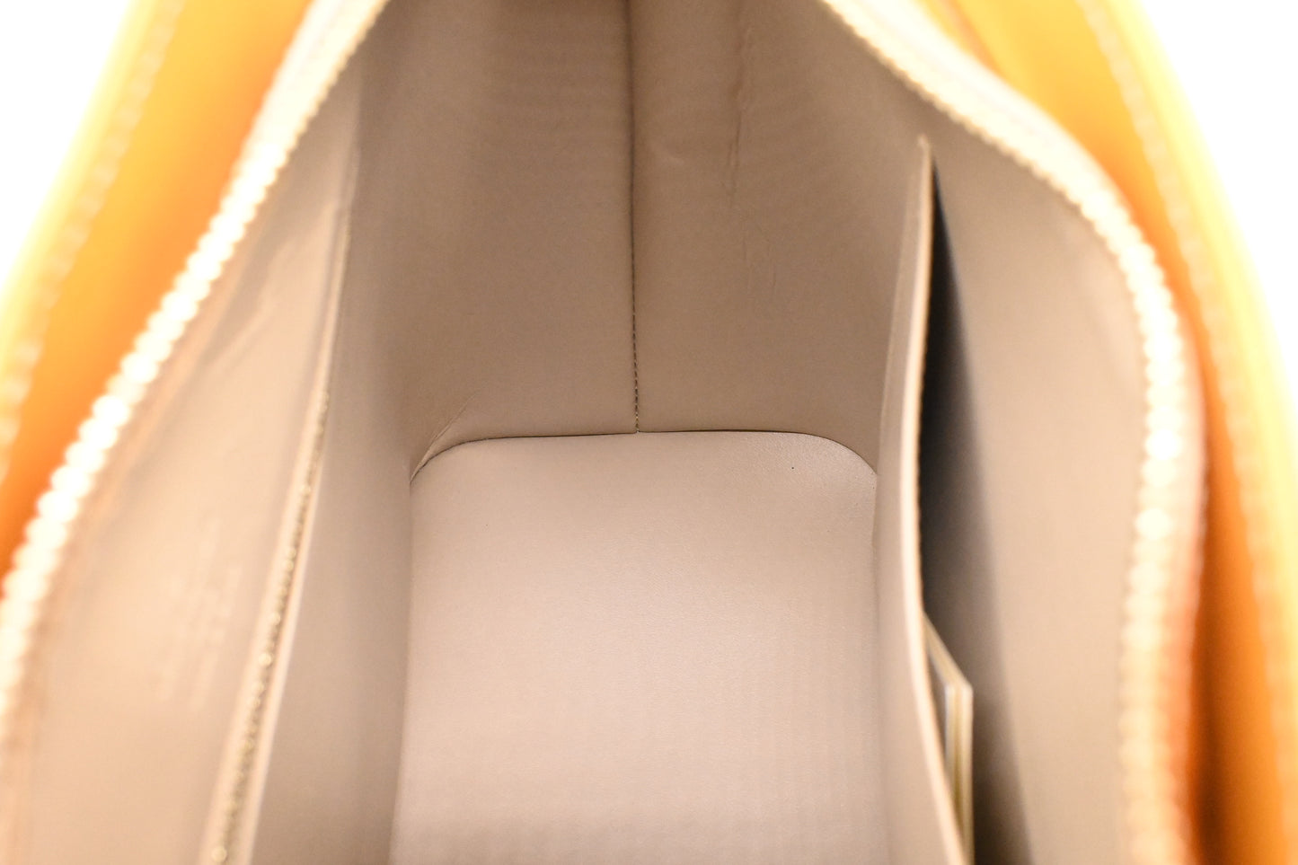 Louis Vuitton Houston in Yellow Vernis Leather