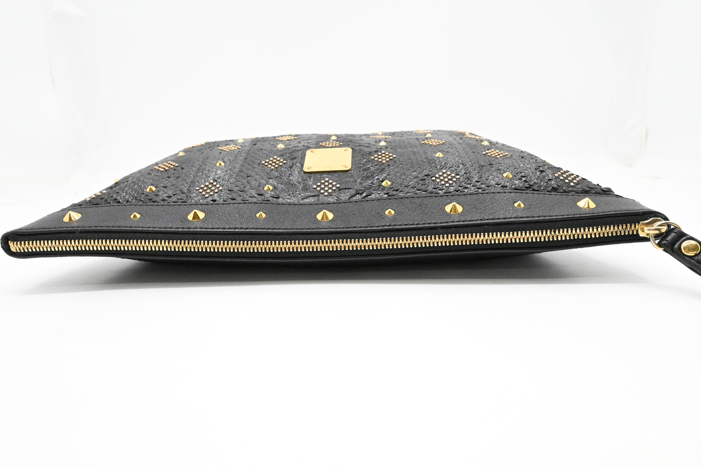 MCM Clutch in Black Faux Python Leather