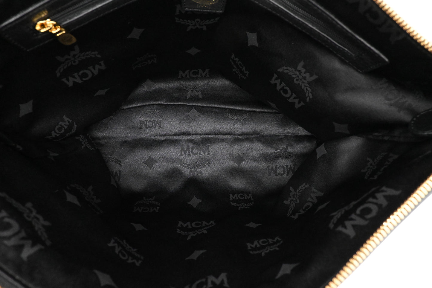 MCM Clutch in Black Faux Python Leather