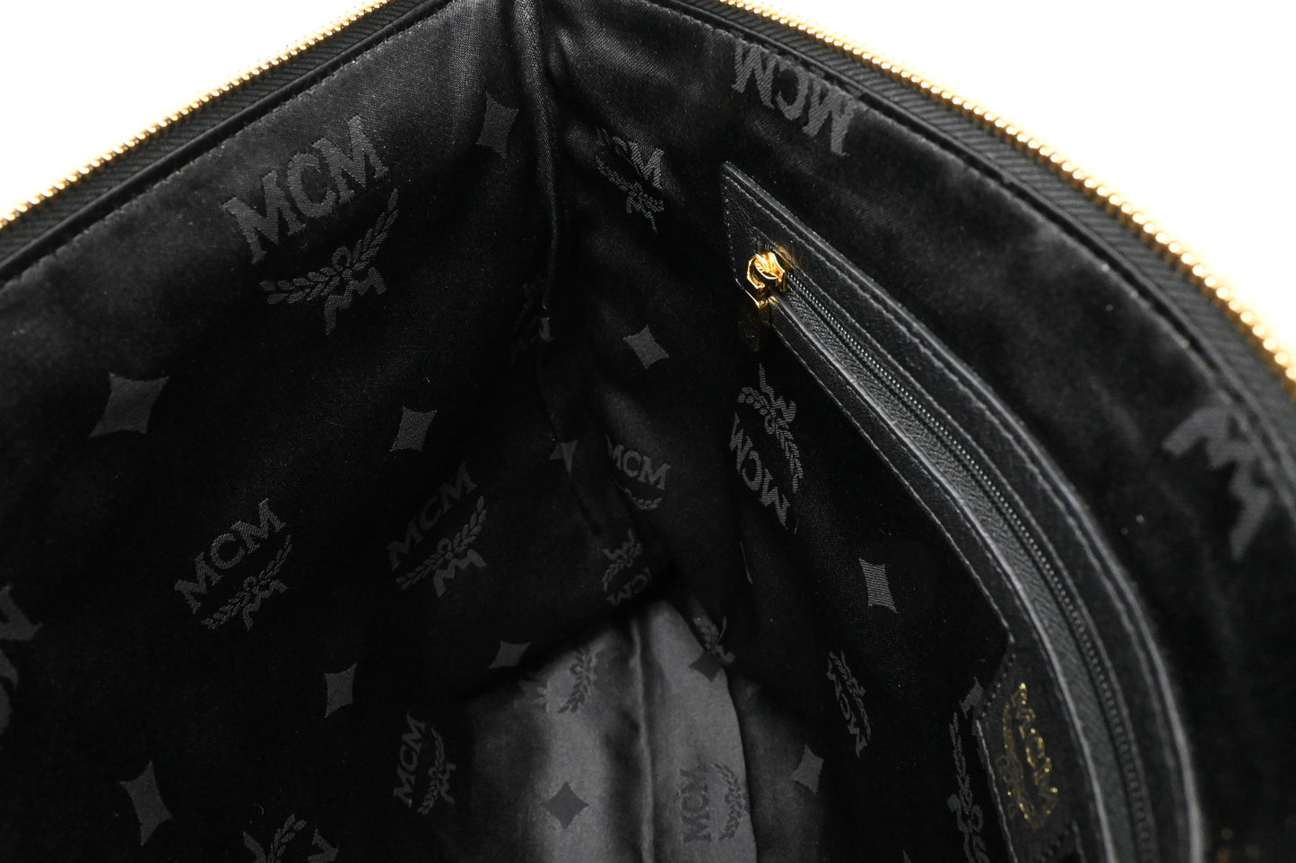 MCM Clutch in Black Faux Python Leather