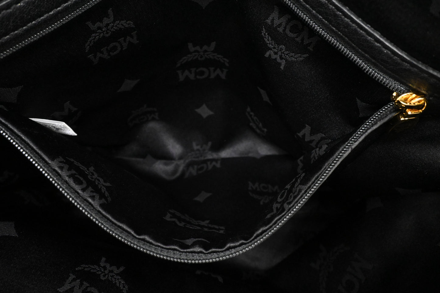 MCM Clutch in Black Faux Python Leather