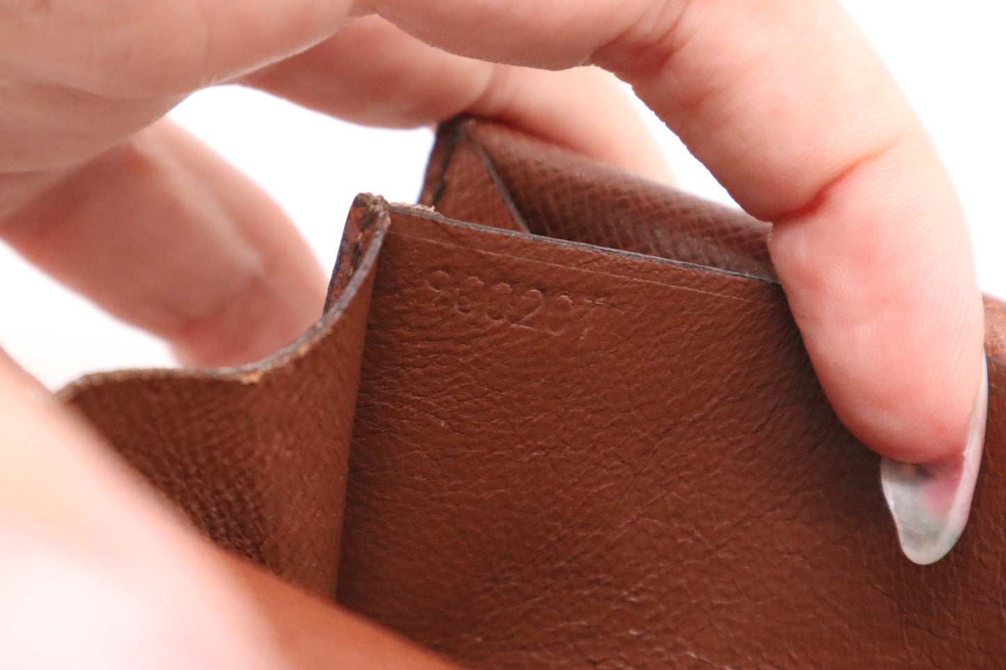 Louis Vuitton Porte Monnaie Gousset in Monogram Canvas