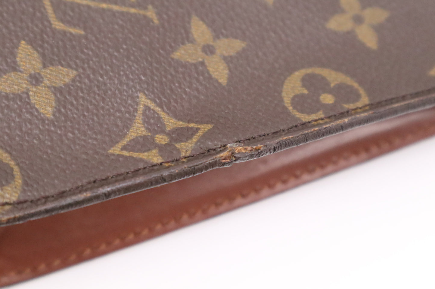 Louis Vuitton Pochette Homme in Monogram Canvas