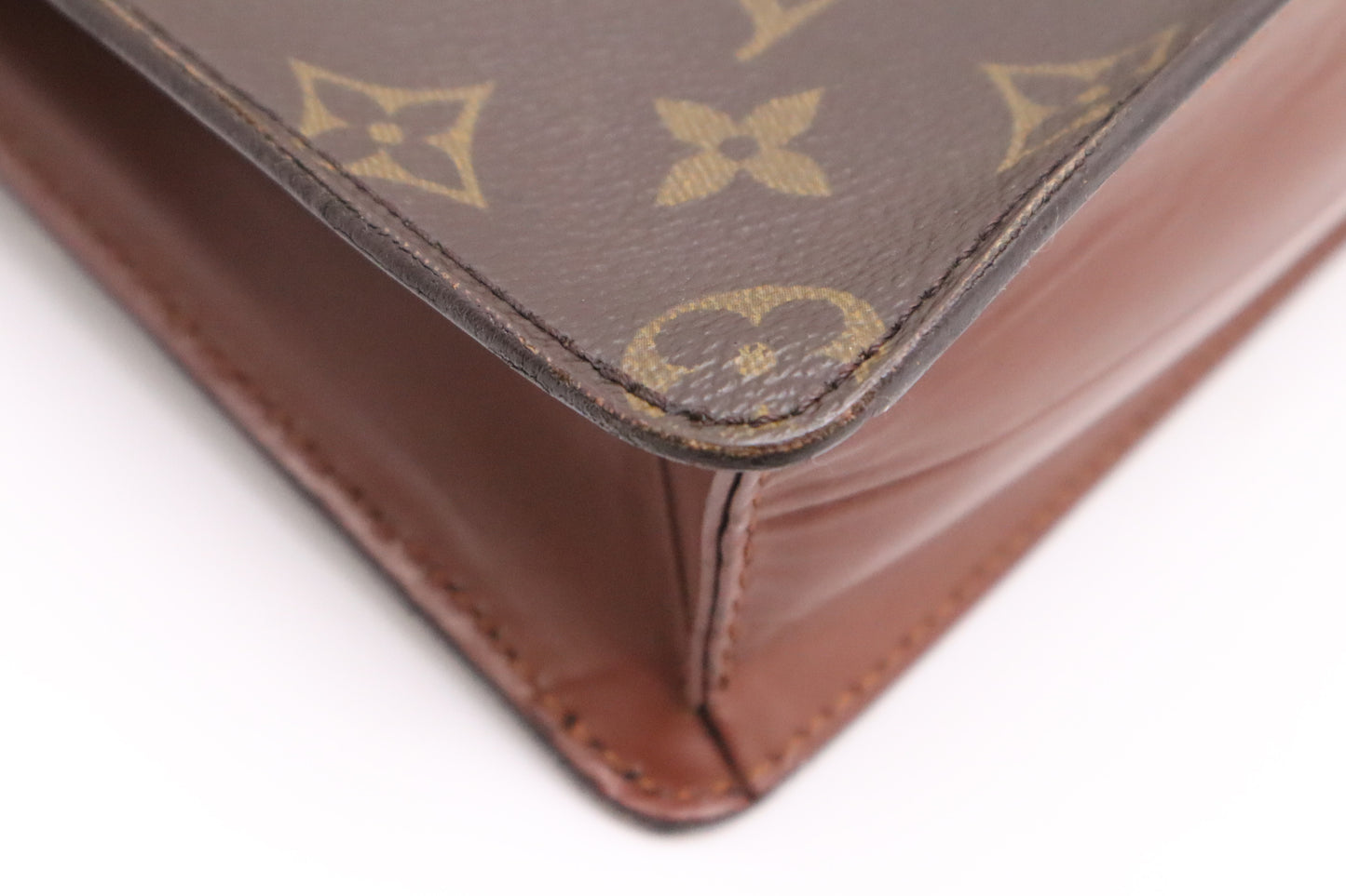 Louis Vuitton Pochette Homme in Monogram Canvas