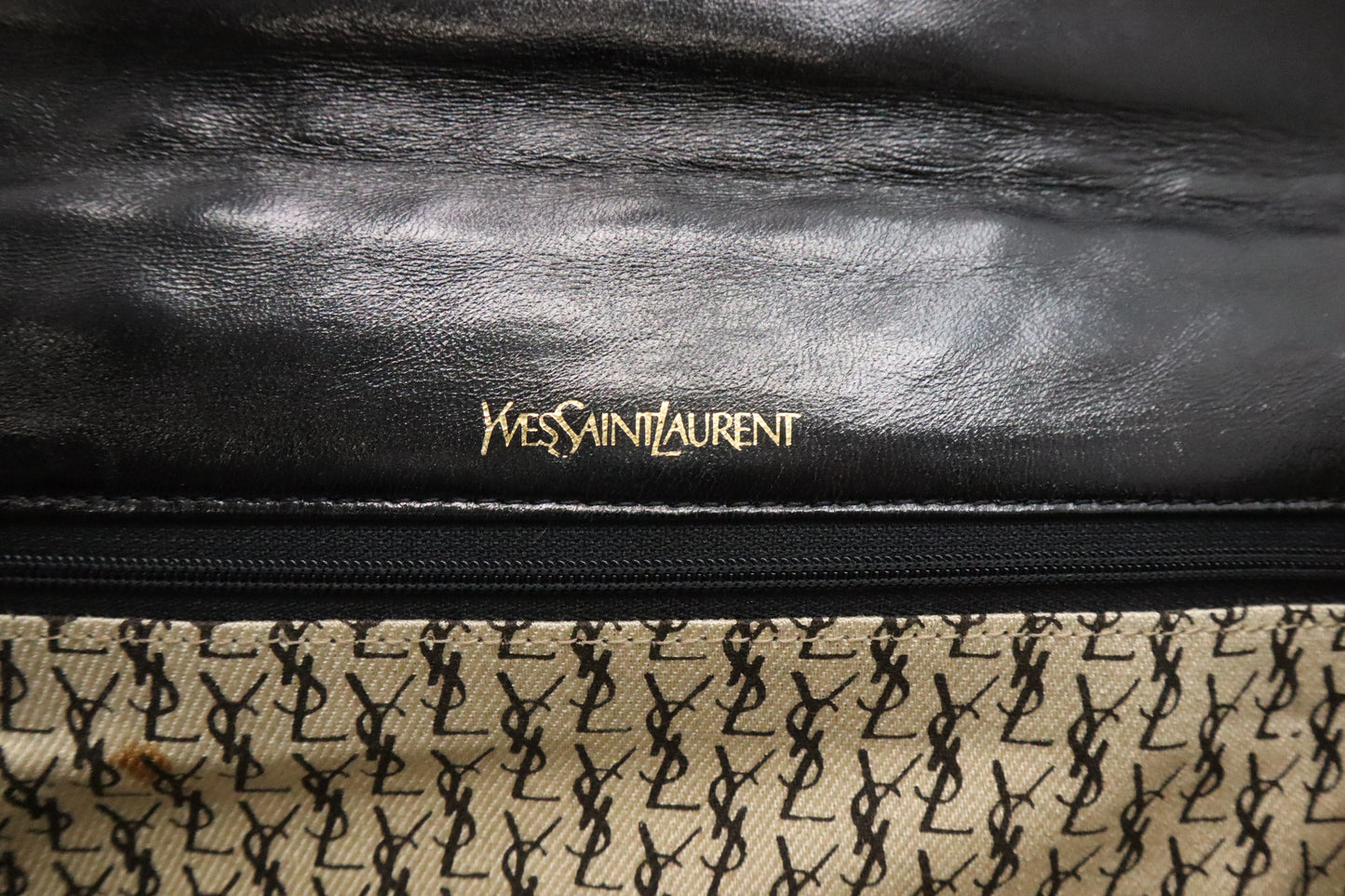 YSL Saint Laurent Clutch in Black Quilted Leather