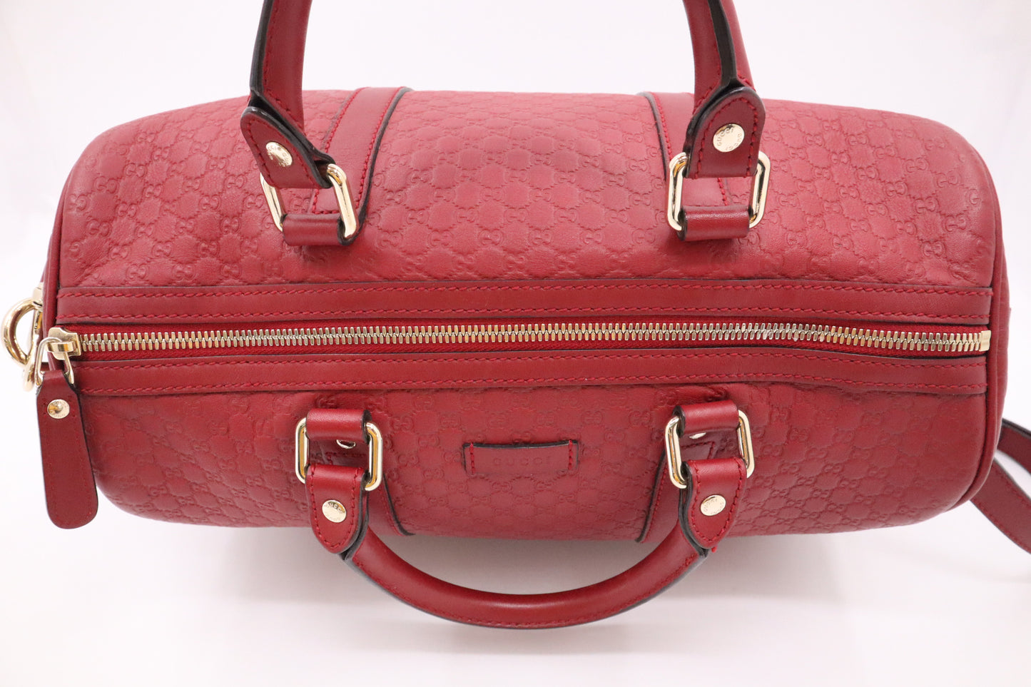 Gucci Boston Bag in Red Micro Guccissima Leather