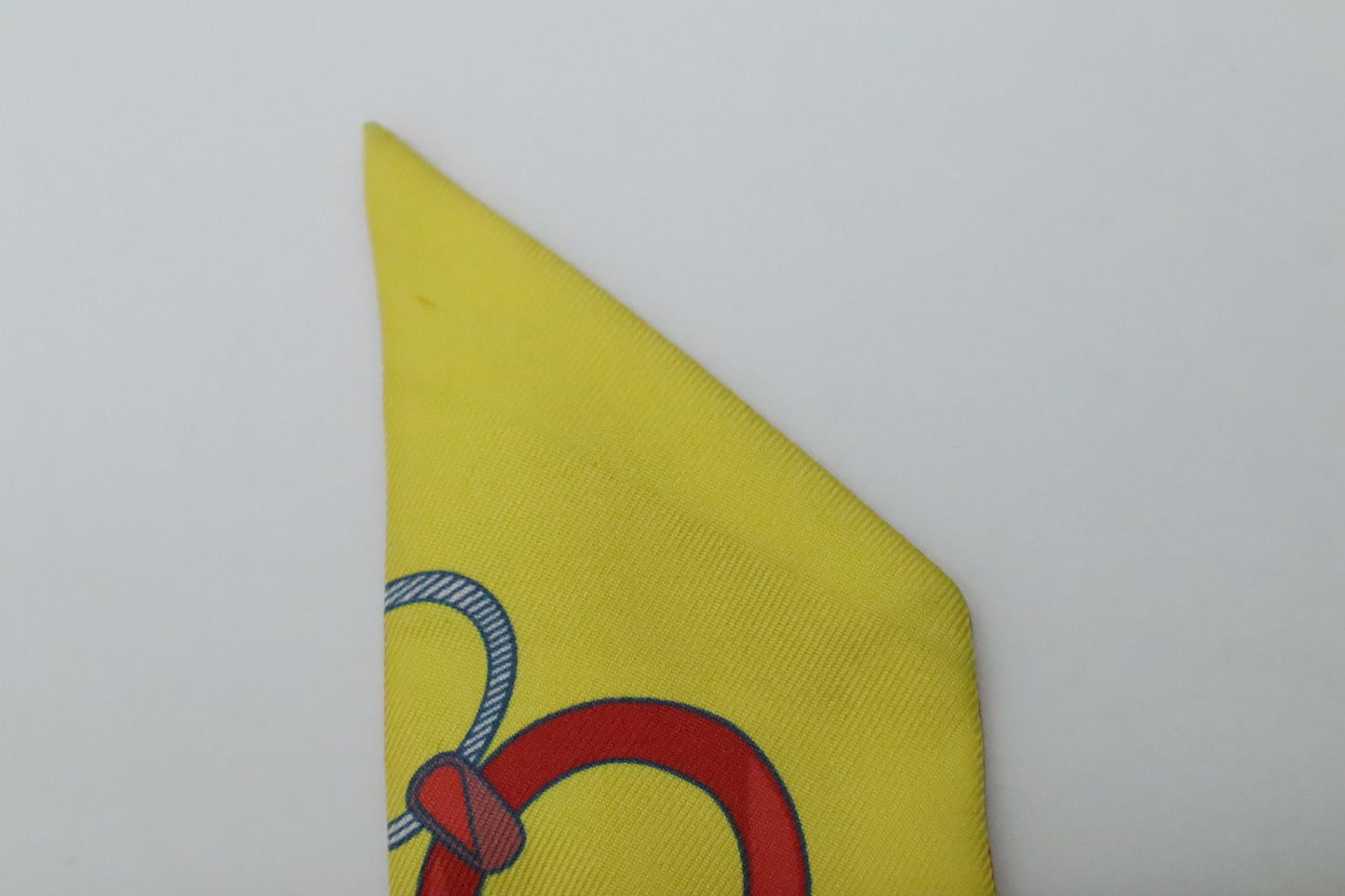 Hermes Twilly 'Do Re Boucles' in Orange & Yellow Silk