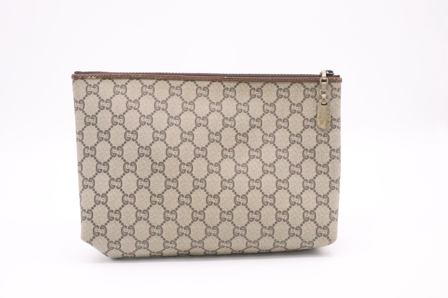 Gucci Plus Clutch in GG Supreme Canvas