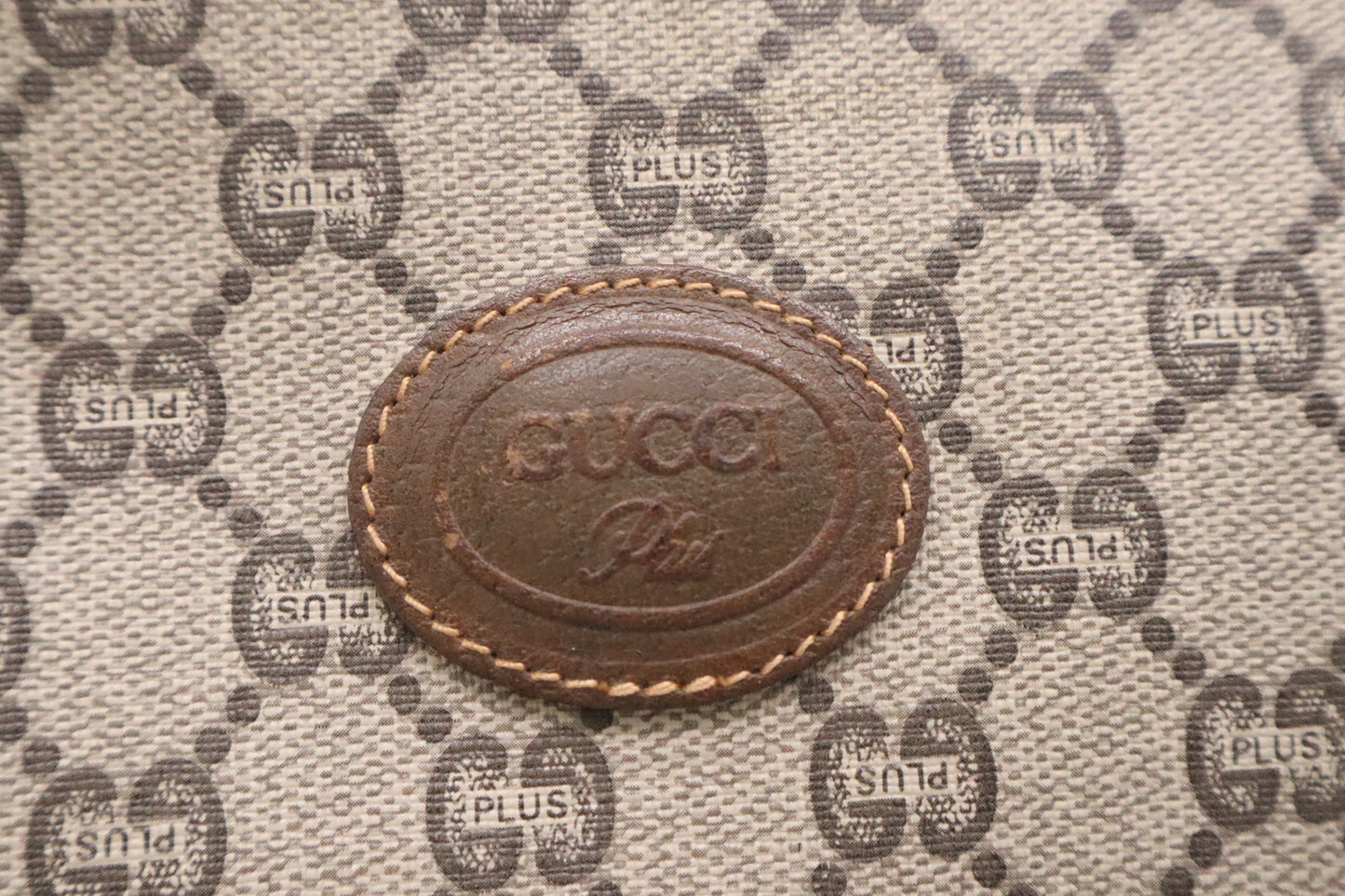 Gucci Plus Clutch in GG Supreme Canvas