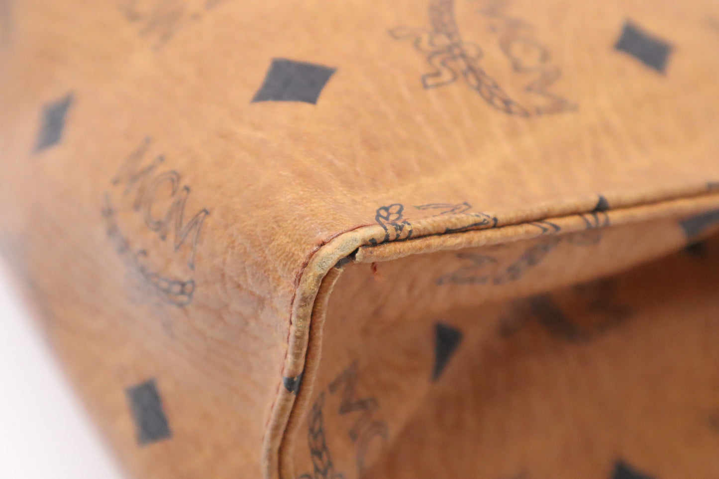 MCM Clutch Bag in Cognac Visetos Coated Canvas