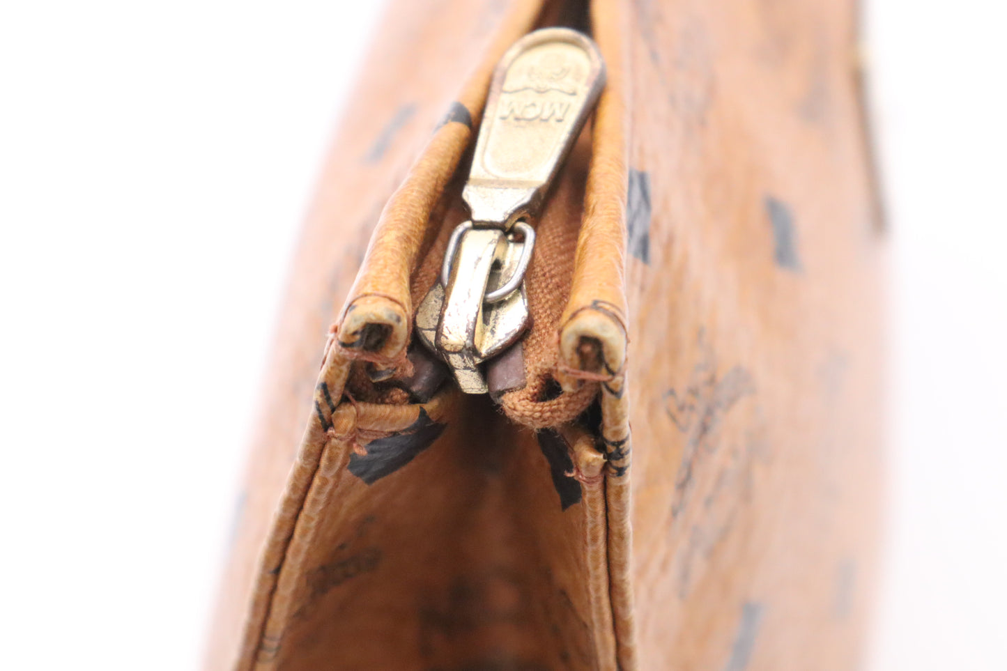 MCM Clutch Bag in Cognac Visetos Coated Canvas