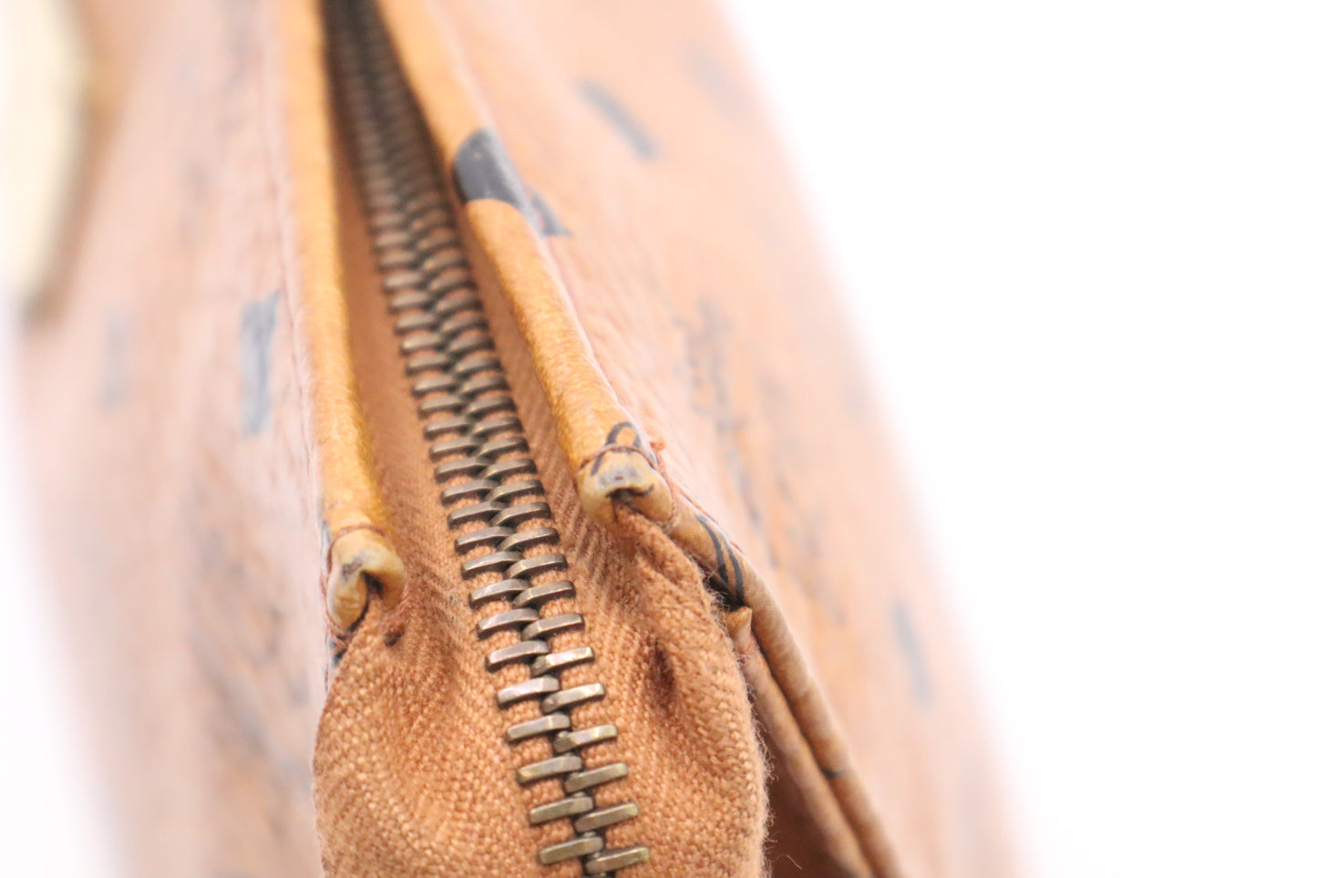 MCM Clutch Bag in Cognac Visetos Coated Canvas