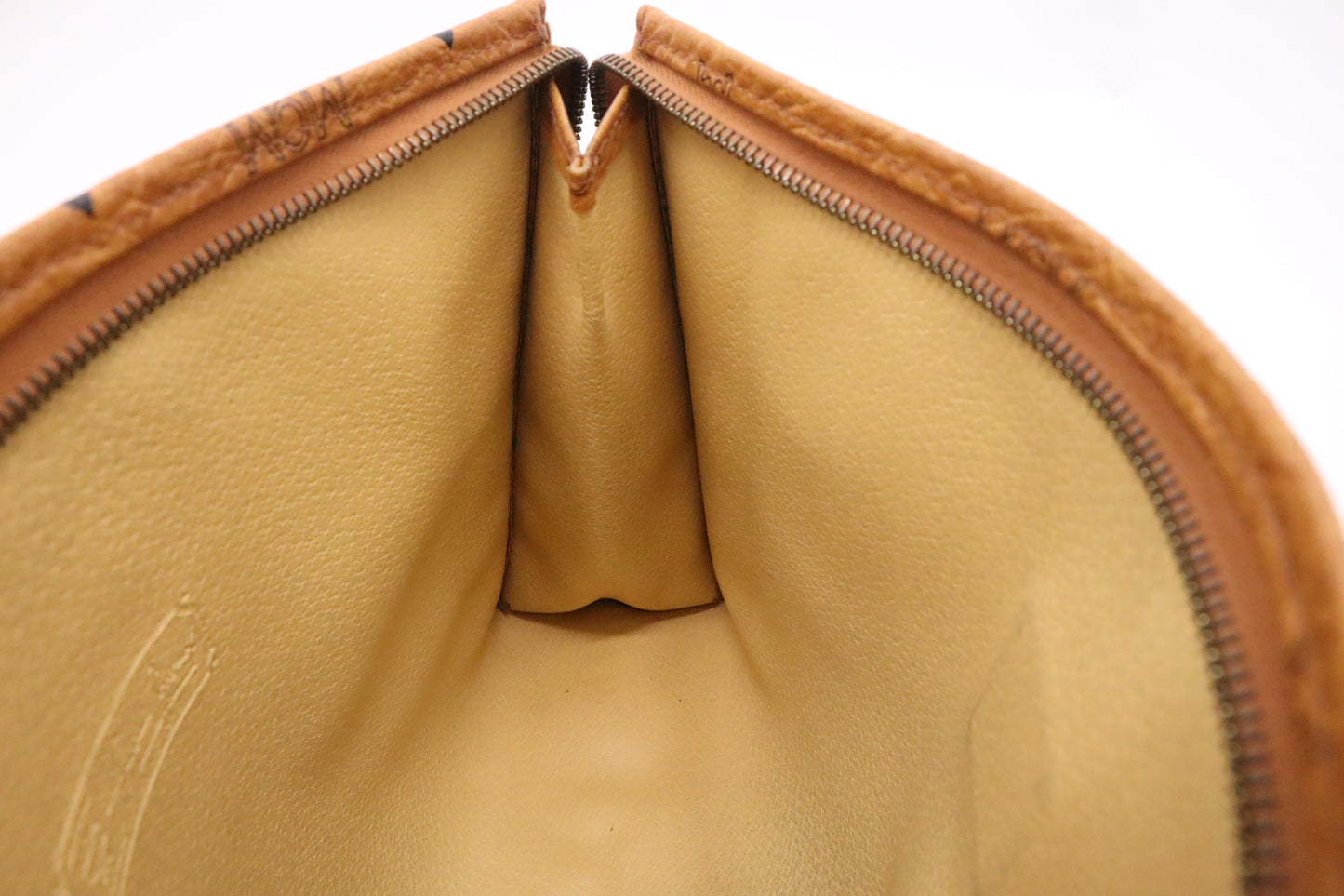 MCM Clutch Bag in Cognac Visetos Coated Canvas