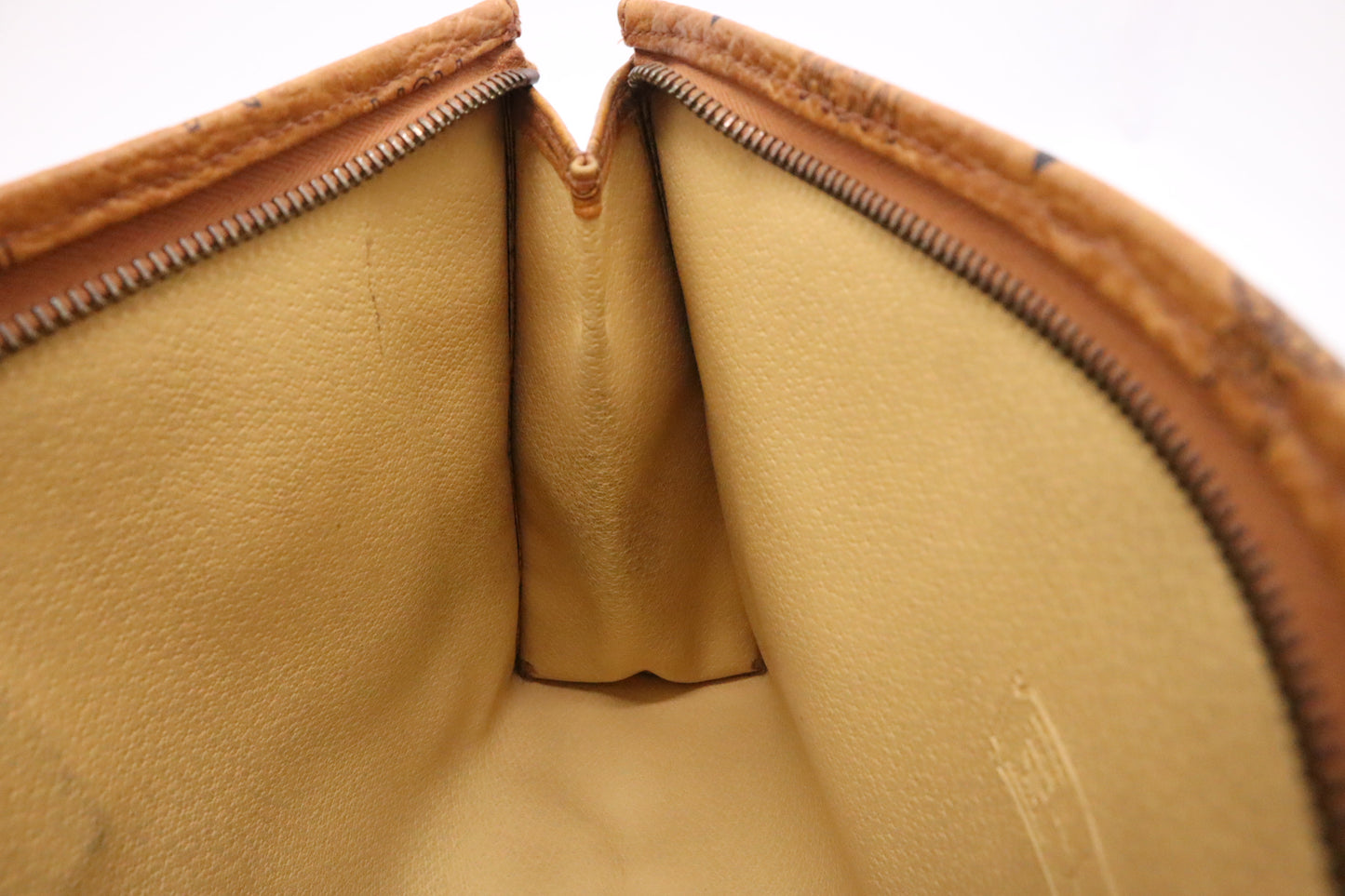 MCM Clutch Bag in Cognac Visetos Coated Canvas
