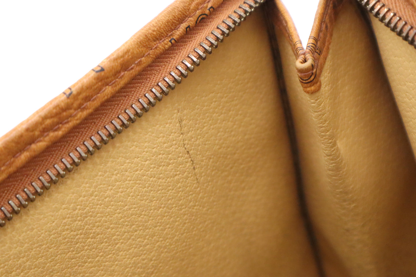 MCM Clutch Bag in Cognac Visetos Coated Canvas