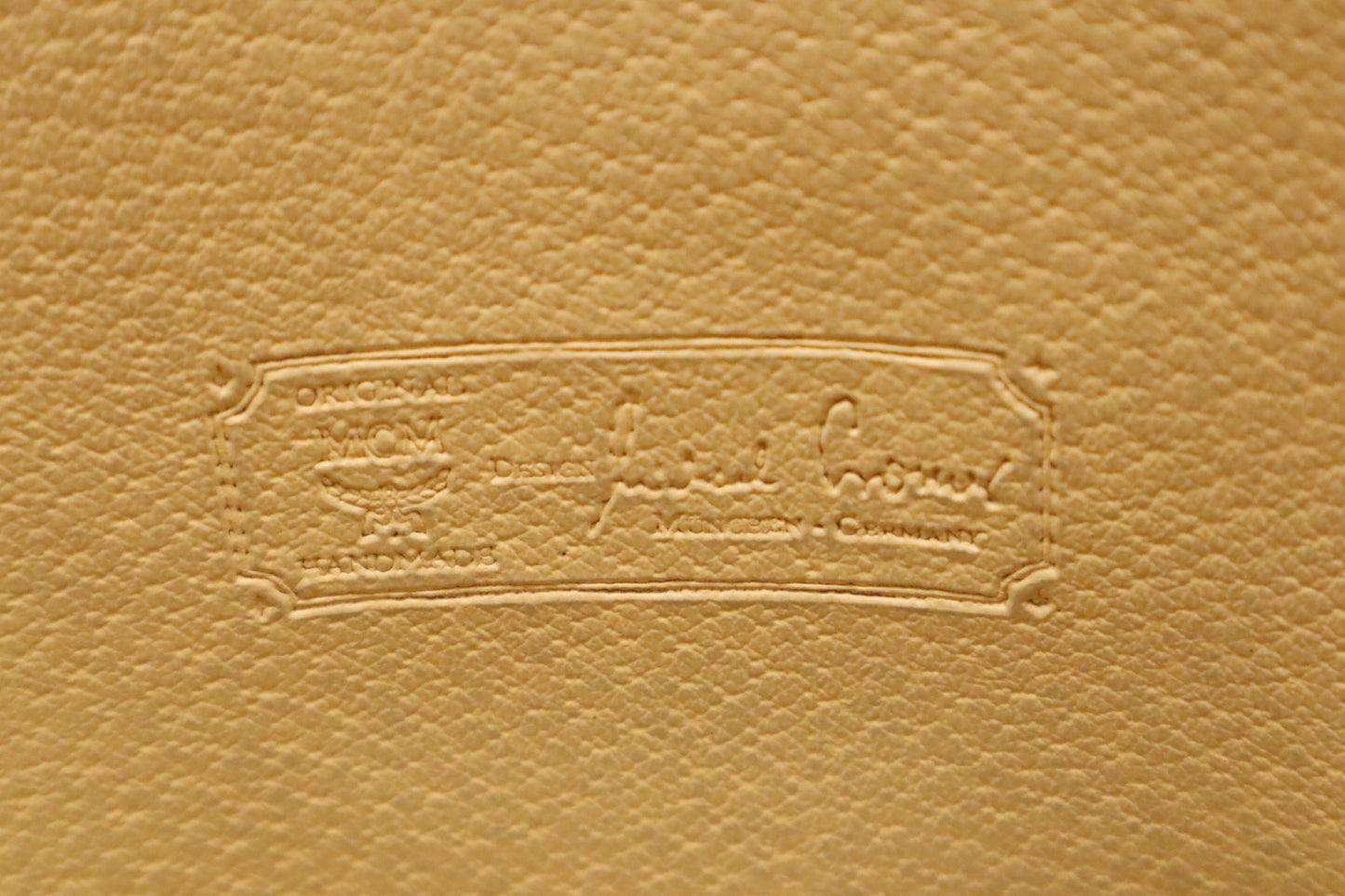 MCM Clutch Bag in Cognac Visetos Coated Canvas