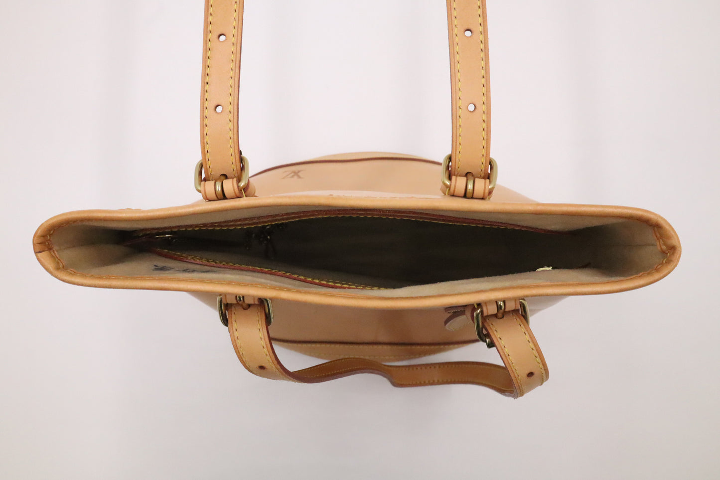 Louis Vuitton Male in Nomade Leather