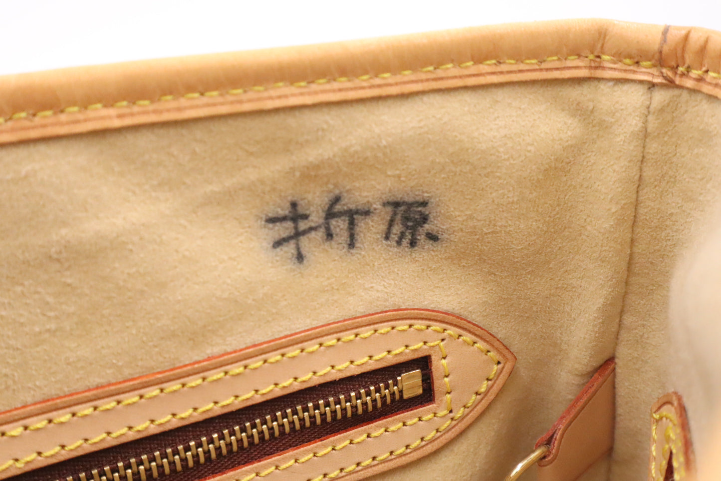 Louis Vuitton Male in Nomade Leather