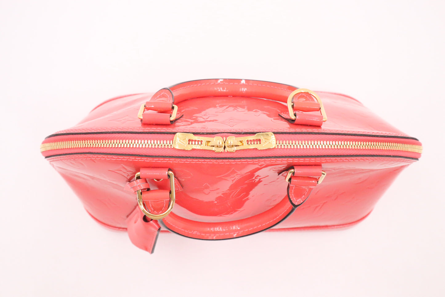 Louis Vuitton Alma PM in Rose Litchi Vernis Leather