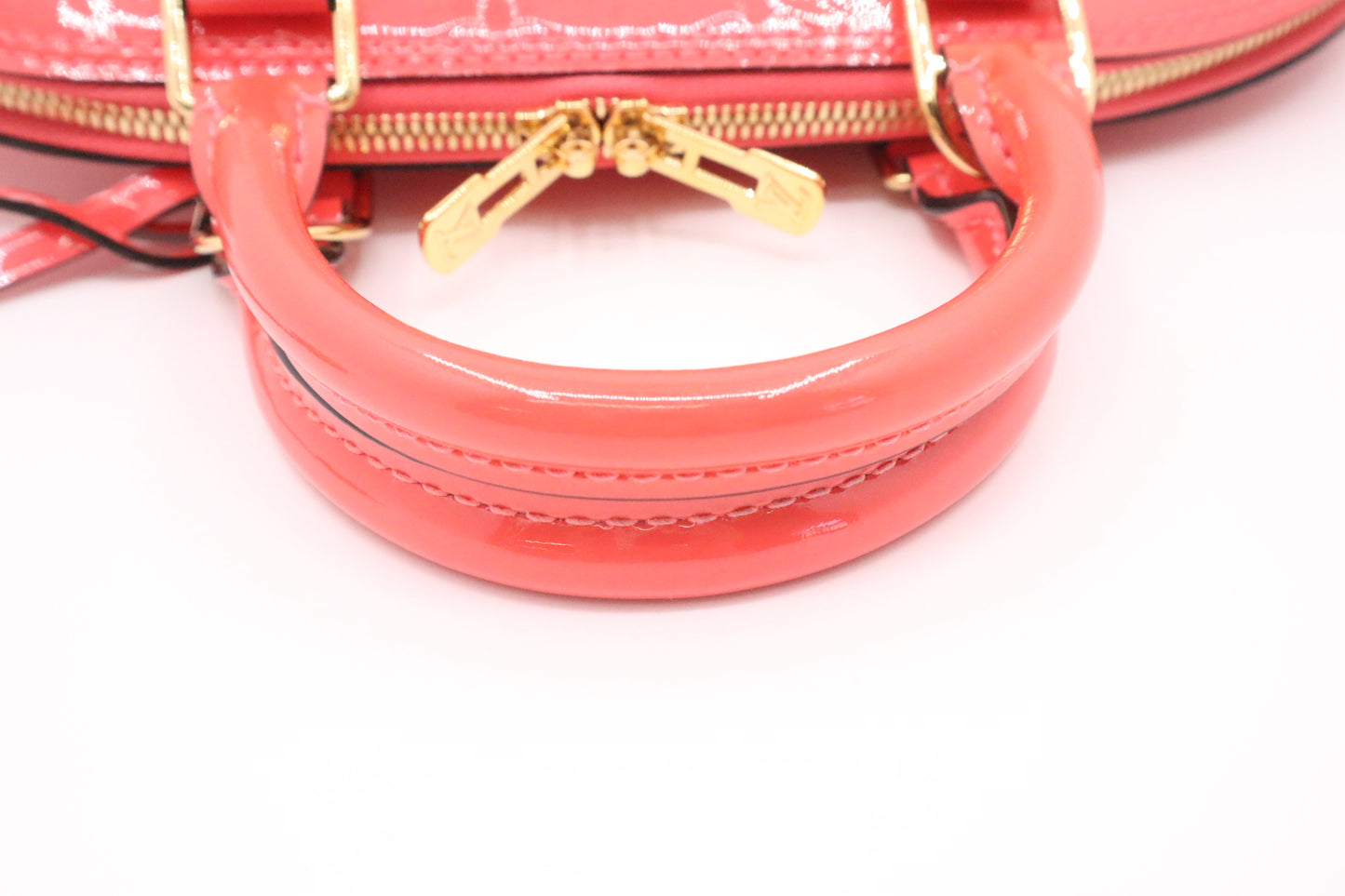 Louis Vuitton Alma PM in Rose Litchi Vernis Leather