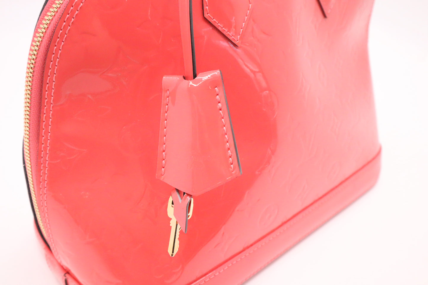 Louis Vuitton Alma PM in Rose Litchi Vernis Leather