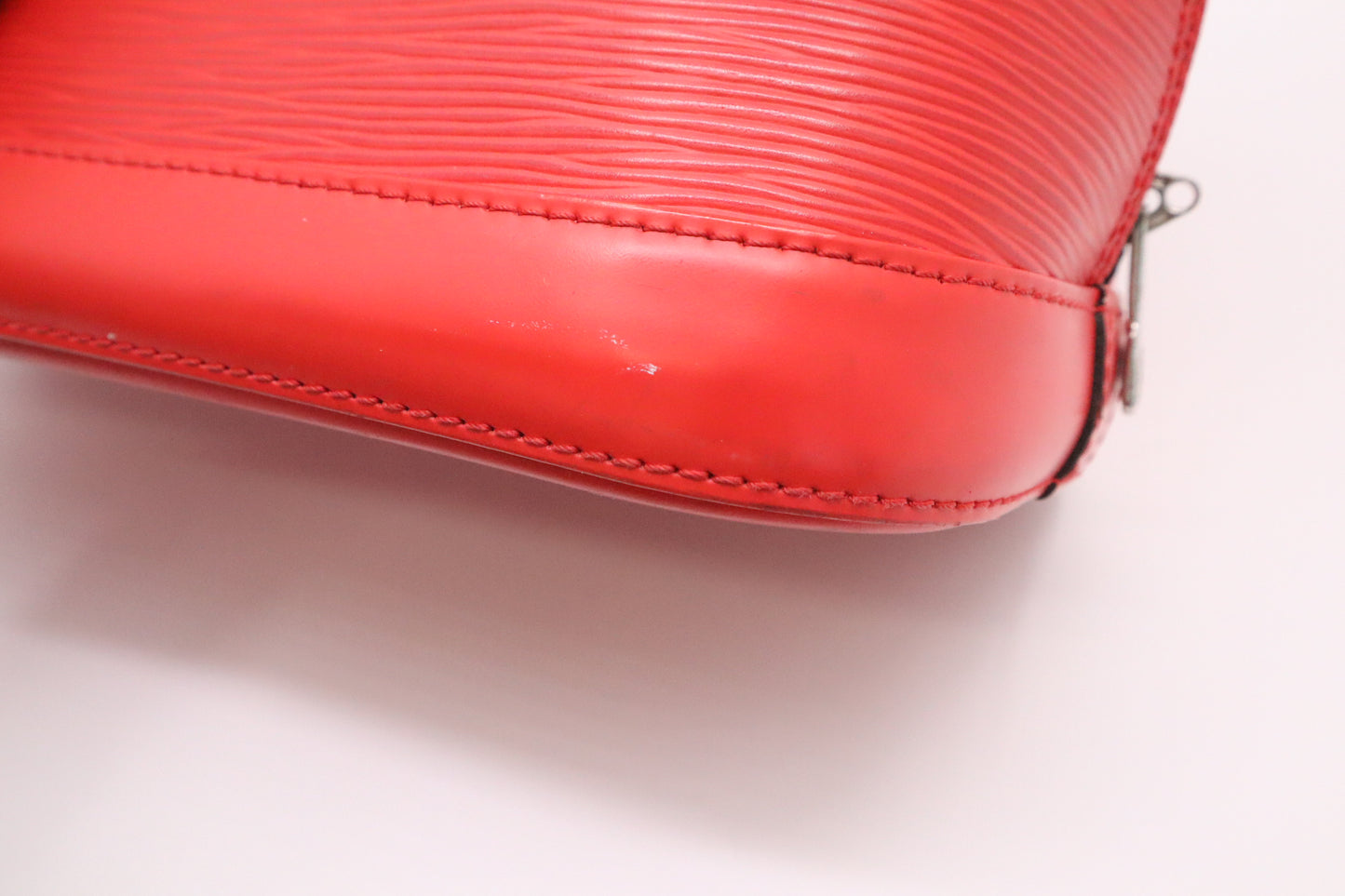 Louis Vuitton Alma PM in Piment Red Epi Leather