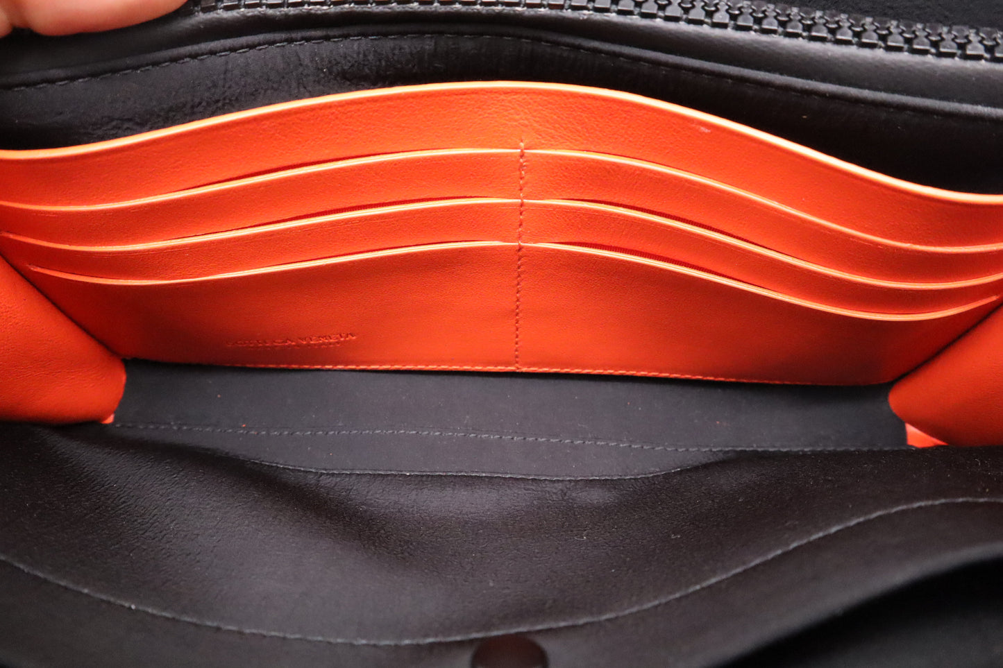 Bottega Veneta Maxi Clutch in Orange Intrecciato Leather