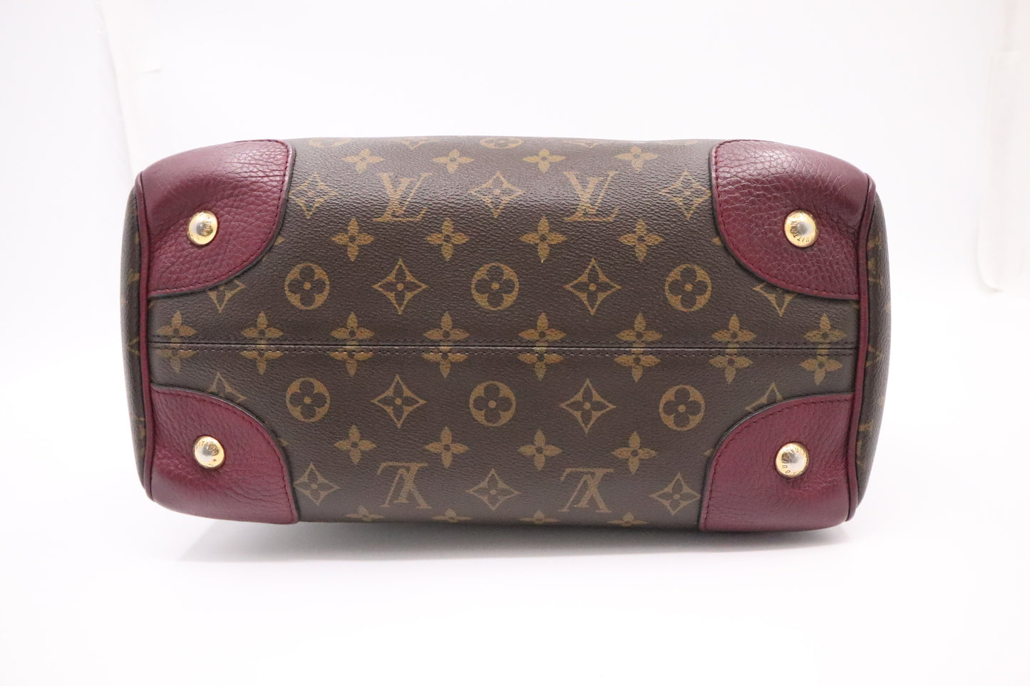 Louis Vuitton Retiro NM in Monogram Canvas and Aurore Leather