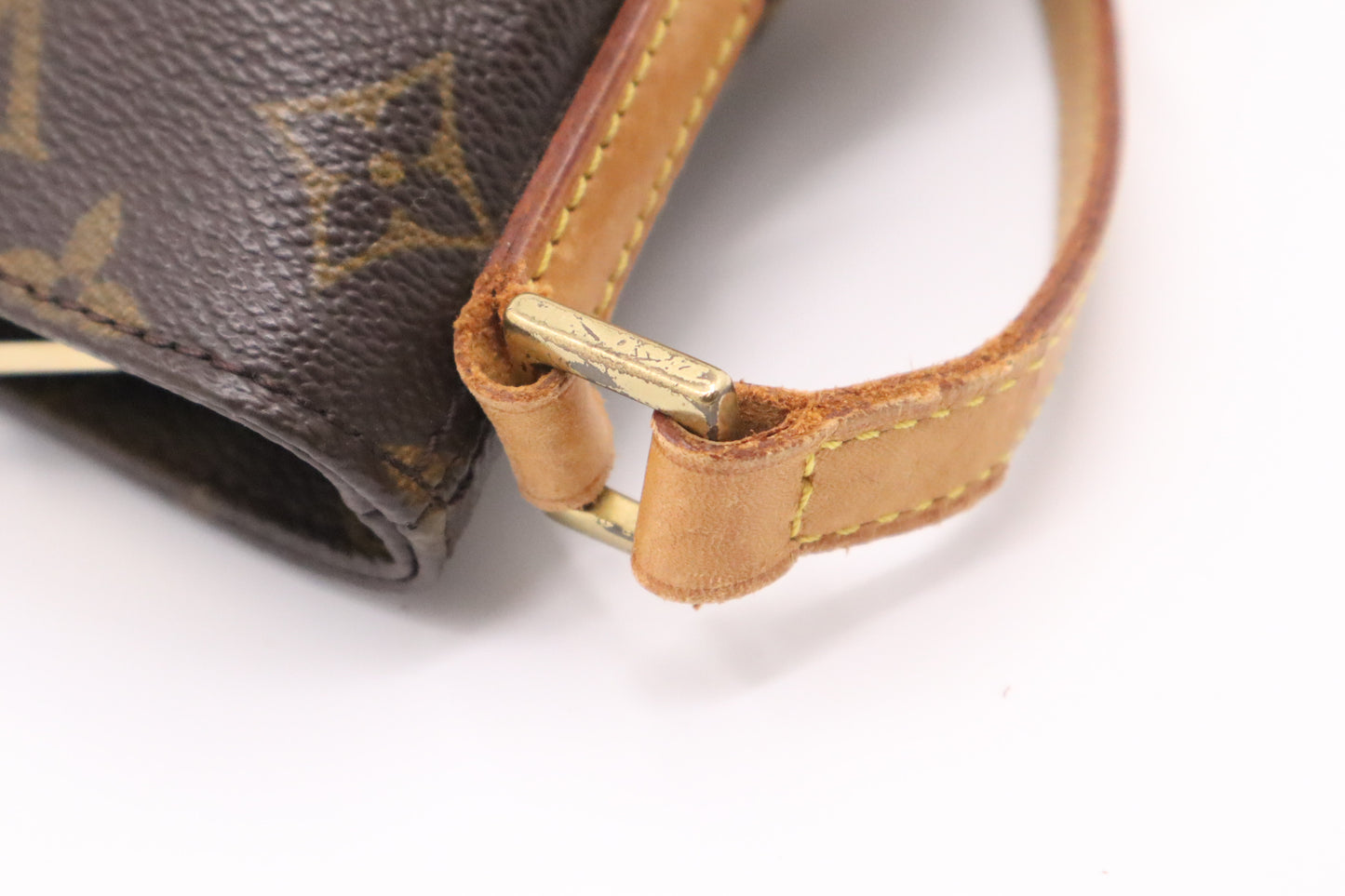Louis Vuitton Trotteur in Monogram Canvas